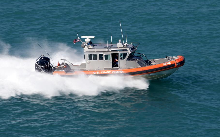 The U.S. Coast Guard rescued three migrants from Cuba from a sinking boat off the Florida Keys Sunday morning.