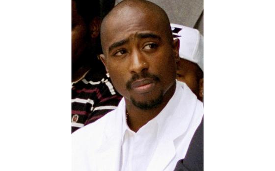 FILE - Rapper Tupac Shakur attends a voter registration event in South Central Los Angeles, Aug. 15, 1996. Las Vegas police said they have made an arrest, Friday, Sept. 29, 2023, for the first time in the 1996 killing of rapper Tupac Shakur. (AP Photo/Frank Wiese, File)