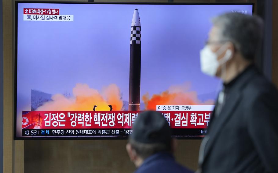 People watch a television screen showing a news program reporting about North Korea’s intercontinental ballistic missile (ICBM) at a train station in Seoul, South Korea, Friday, March 25, 2022. A major United Nations meeting on the landmark nuclear Non-Proliferation Treaty is starting Monday, Aug. 1, 2022, after a long delay due to the COVID-19 pandemic, as Russia’s war in Ukraine has reanimated fears of nuclear confrontation and cranked up the urgency of trying reinforce the 50-year-old treaty.