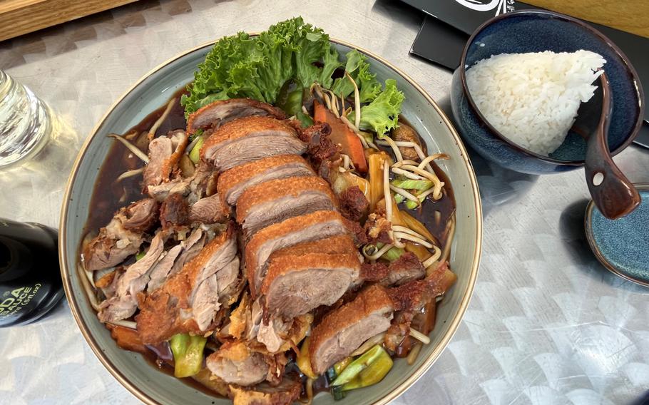 The crispy duck on a summer day at Kiko in Kaiserslautern, Germany. Sushi is prominent on the dinner menu, but there are several Vietnamese and pan-Asian dishes as well.