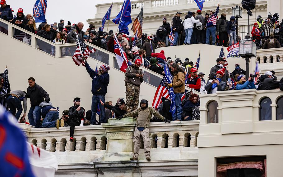 Members of the military participated in the storming of the U.S. Capitol following a rally with President Donald Trump on Wednesday, Jan. 6, 2021, in Washington, D.C., adding to evidence that extremism is fomenting in the military ranks.