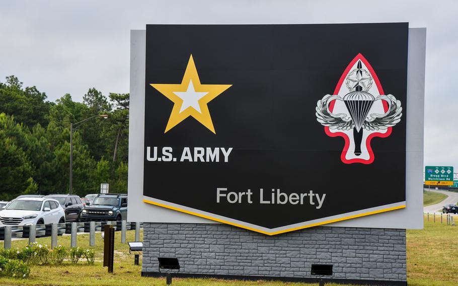 a picture of the fort liberty gate sign