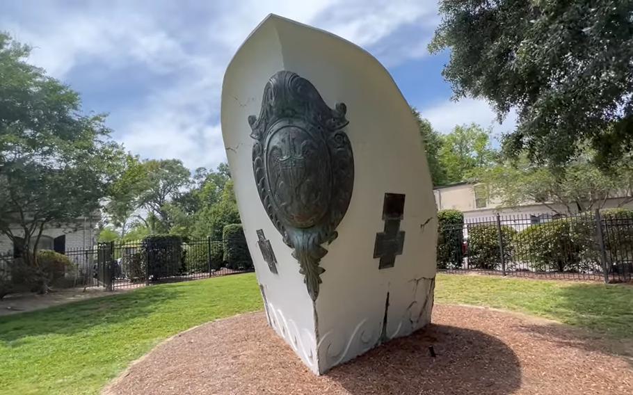 The Spanish-American War Memorial’s centerpiece is the 5-foot, brass figurehead bearing the Great Seal of the United States that once fronted the battleship USS Louisiana, shown in this screenshot from video.