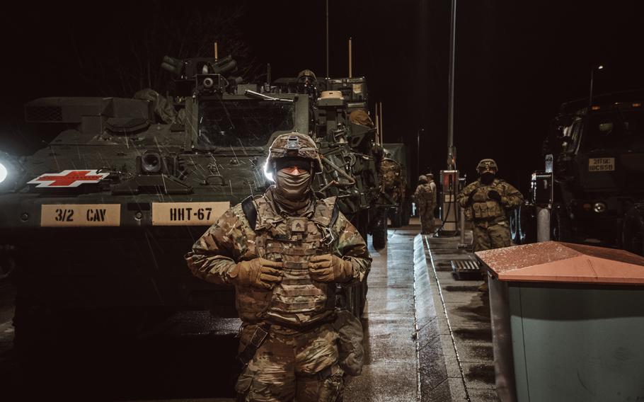 Soldiers assigned to 3rd Squadron, 2nd Cavalry Regiment, refuel their vehicles while on a tactical road march from Germany to Latvia on Feb. 21, 2022. About 300 additional soldiers are expected to head to Poland and Germany to support V Corps operations on NATOs eastern flank.