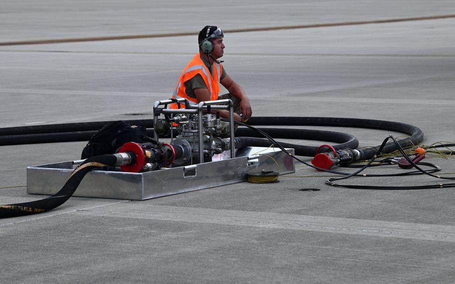 U.S. Air Force Staff Sgt. Alberto Silva, 9th Expeditionary Bomb Squadron, waits to refuel B-1B Lancers using the new Versatile Integrating Partner Equipment Refueling kit at Spangdahlem Air Base, Germany, Oct. 11, 2021. 