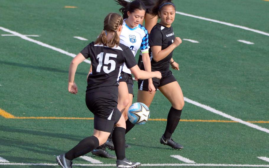 Syra Soto, right, transferred to Humphreys after playing for Kubasaki last year; Vivian Machmer, with ball, leads Osan's girls (2-7-1) with 12 goals.
