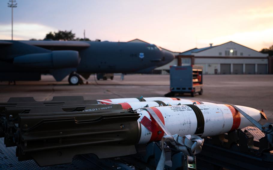 MK-62 Quickstrike naval mines sit in front of a B-52H Stratofortress at Barksdale Air Force Base, La., Aug. 25, 2021, a day before the bomber deployed to Guam. 