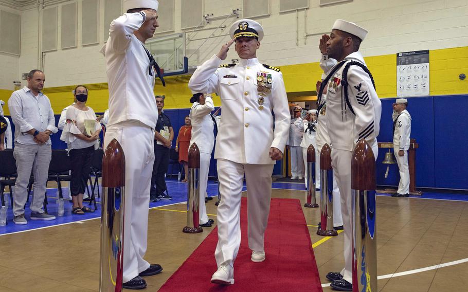 Capt. Odin Klug renders a salute as he prepares to assume command of U.S. Naval Support Activity Souda Bay, Greece, on July 29, 2022.