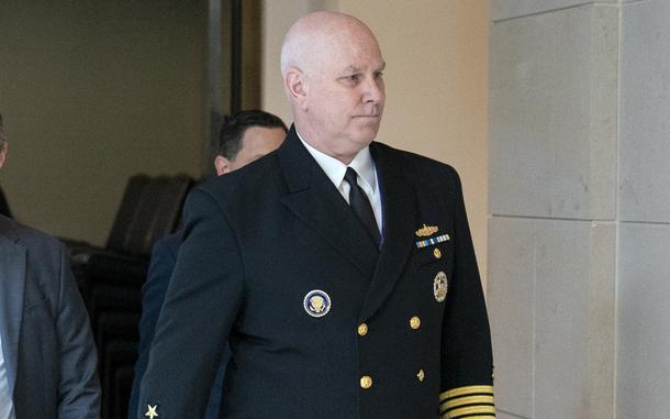 Vice Chairman of the Joint Chiefs, Adm. Christopher Grady, right, arrives for a closed door briefing about the leaked highly classified military documents, on Capitol Hill, April 19, 2023, in Washington. Grady says there's been no final decision on whether or not all U.S. troops will leave Niger and Chad.
