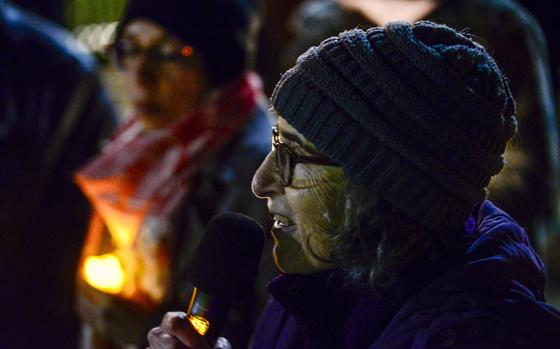 Rabbi Amita Jarmon of the Brattleboro, Vt., Area Jewish Community talks against hate speech during a vigil in Pliny Park in Brattleboro, Monday, Nov. 27, 2023, for the three Palestinian-American students who were shot while walking near the University of Vermont campus in Burlington, Vt., Saturday, Nov. 25. The three students were being treated at the University of Vermont Medical Center, and one faces a long recovery because of a spinal injury, a family member said. (Kristopher Radder/The Brattleboro Reformer via AP)