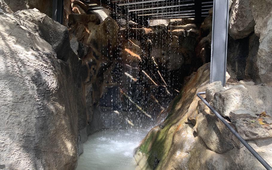 There are more than a dozen themed thermal and marine pools, including this one with a walk-through rain shower, at Negombo Park on the island of Ischia near Naples, Italy. 