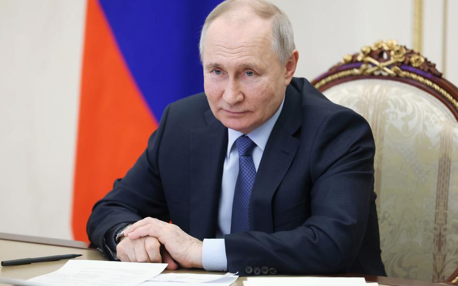 Russian President Vladimir Putin chairs a meeting on the social and economic development of Crimea and Sevastopol via a videoconference at the Moscow’s Kremlin in Moscow, Russia, Friday, March 17, 2023. 