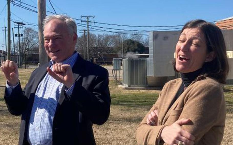 Sen. Tim Kaine and Rep Elaine Luira, D-Norfolk, discuss a recent helicopter tour of Hampton Roads Coast Guard operations.