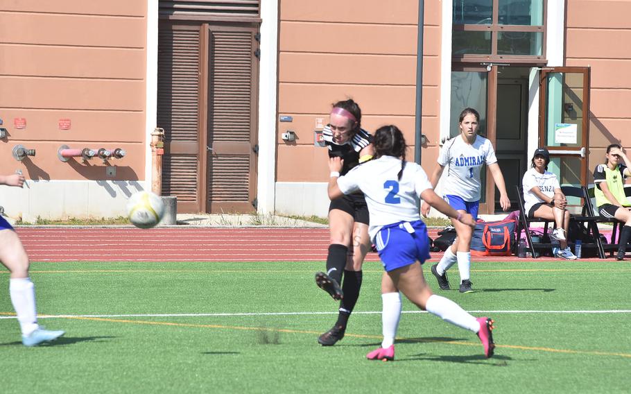 Vicenza's Riley West takes a shot on goal before Rota's Michelle Valezquez-Santiago can get to her Friday, April 29, 2022 in the Cougars 7-0 victory.