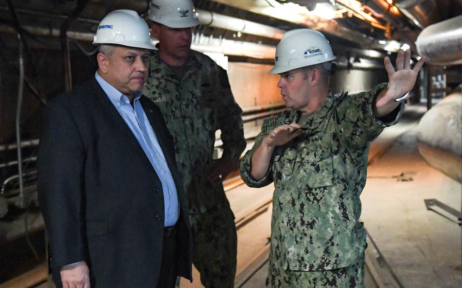 Capt. Albert Hornyak, commanding officer of Fleet Logistics Center Pearl Harbor, briefs Navy Secretary Carlos Del Toro during a tour of the Red Hill Well in Aiea, Hawaii, Feb. 26, 2022. Hornyak was relieved of duty April 4, 2022, due to a loss of confidence in his ability to perform his duties, the Navy said.