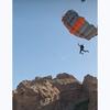 A video screen grab shows a parachute deploying after a 22 Jumps participant leapt off a cliff in Idaho.