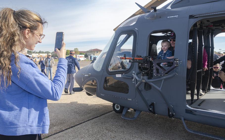 Visitors to the Beyond the Horizon Air and Space Show explore the MH-139A Grey Wolf static display at Maxwell Air Force Base, Ala., Saturday, April 6, 2024.