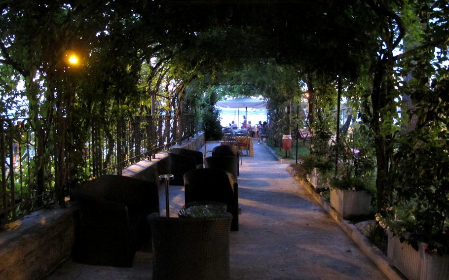 Hotel Catullo in Sirmione, Italy, provides a shady glade for drinks, before or after a meal.