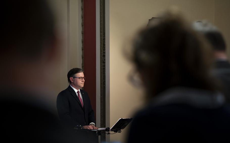 House Speaker Mike Johnson (R-La.) does a TV interview Wednesday on Capitol Hill.