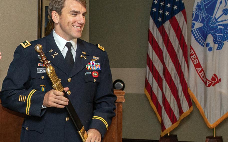 Maj. William J. Doyle receiving the Lt. Col. Ronald C. Ward Distinguished Special Operations Forces Student Award for the Command and General Staff Officer Course class of 2018 in a ceremony at Fort Leavenworth, Kan. As a captain, Doyle was instrumental in a brutal fight to retake an al-Shabab stronghold in Somalia in 2015, for which he was awarded the Silver Star.