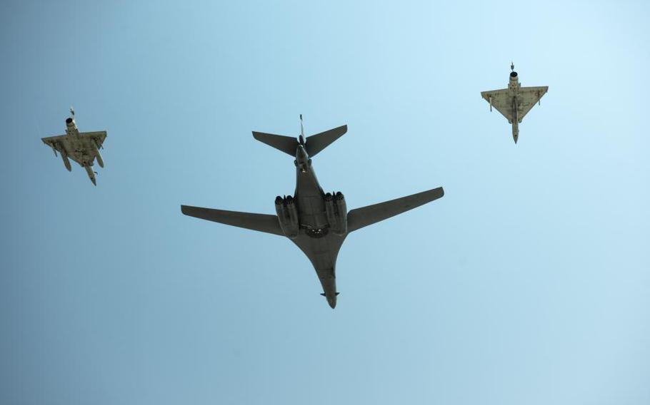 A U.S. Air Force B-1B Lancer from the 9th Expeditionary Bomb Squadron, Dyess Air Force Base, Texas, flies a Bomber Task Force mission alongside two French Dassault Mirage 2000s over Camp Lemonnier, Djibouti, Nov. 11, 2021.