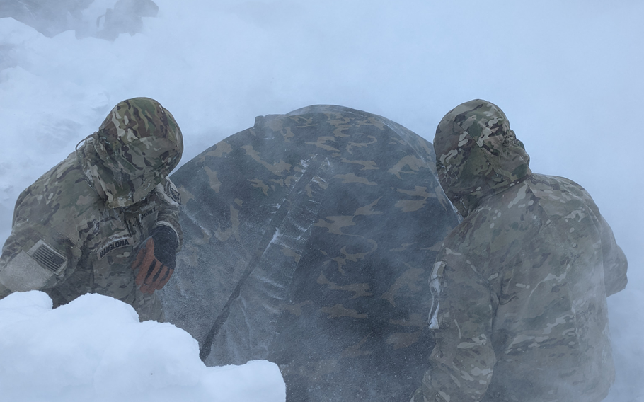 Soldiers with the 173rd Airborne Brigade establish a campsite in the Dolomite Mountains during a multiweek exercise in winter warfare techniques led by the Italian army. The training included mountainside war games lasting three days that used Ospreys and Italian helicopters to insert troops 8,200 feet high on a mountain.