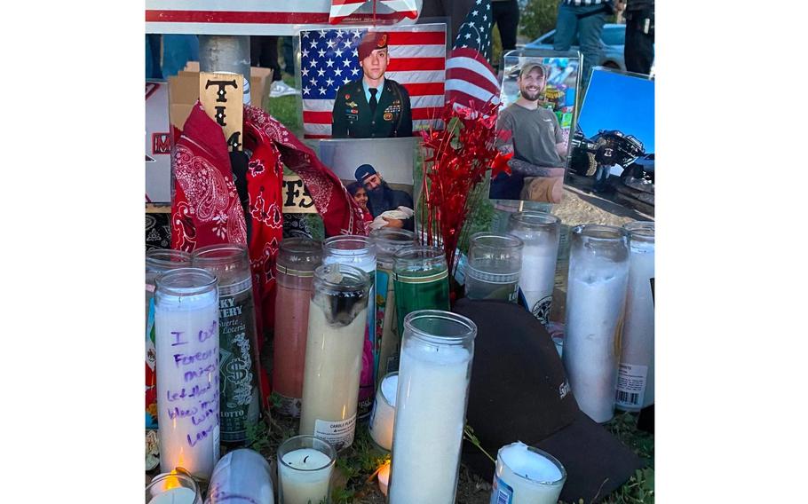 Candles and pictures memorializing an Army veteran who died