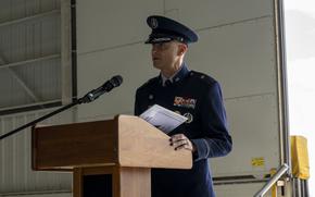 A man in a Space Force uniform speaks at a podium.
