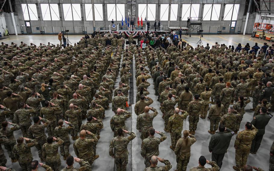 New York Air National Guard Col. Christian Sander, onstage, receives his final salute from the wing’s airmen during the 109th Air Wing change of command ceremony at Stratton Air National Guard Base, Saturday, March 2, 2024. During the ceremony, command passed from Sander to Col. Robert Donaldson.