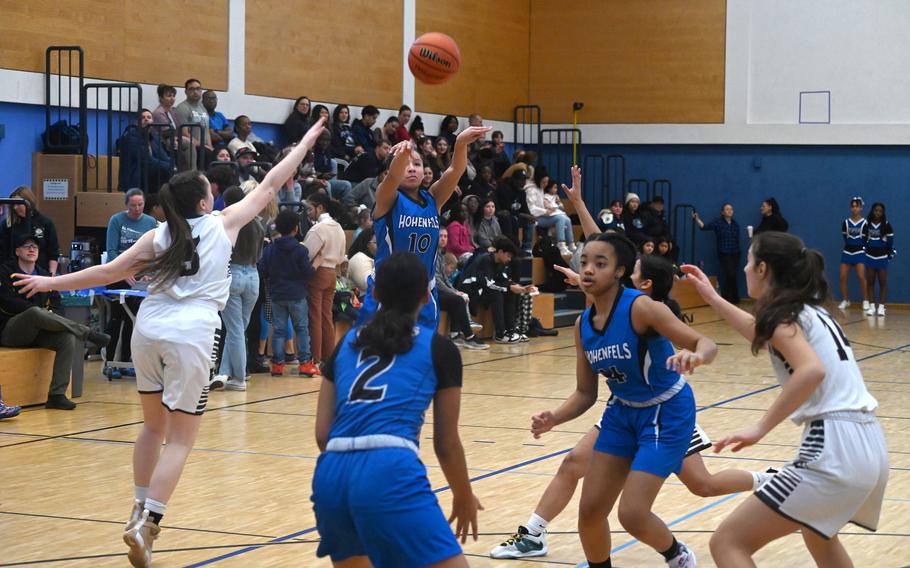 Hohenfels’ Malea Jobity pulls up for a three-pointer early in the first quarter of a game against AFNORTH at Hohenfels High School on Jan. 13, 2024. Jobity finished the day with 12 of Hohenfels' 34 points. 