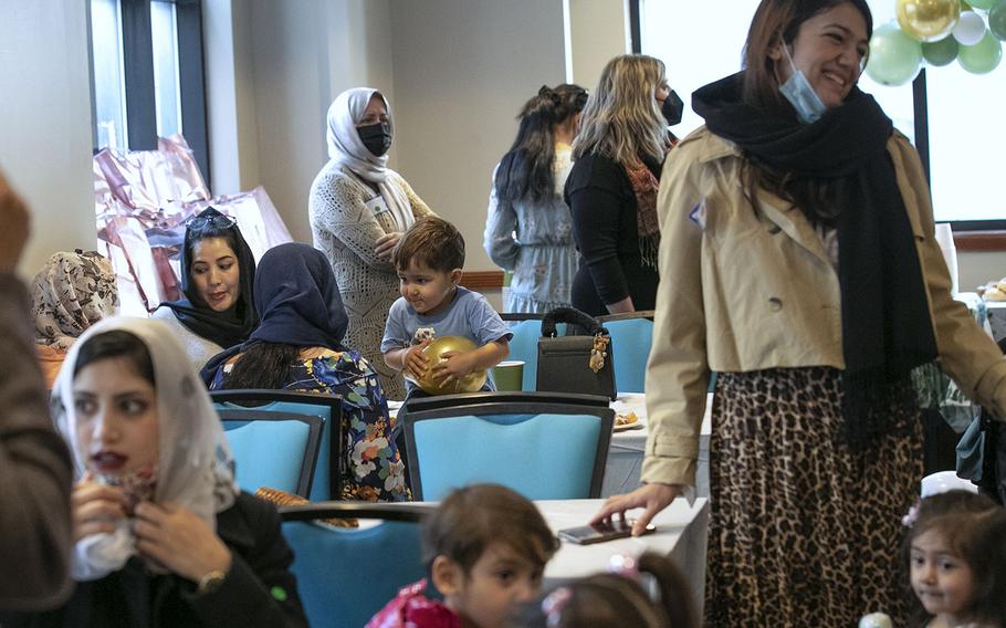 Afghan women and their children attend a baby shower hosted by the Nationalities Service Center at the Philadelphia Residence Inn by Mariott on Wednesday, Feb. 16, 2022. 