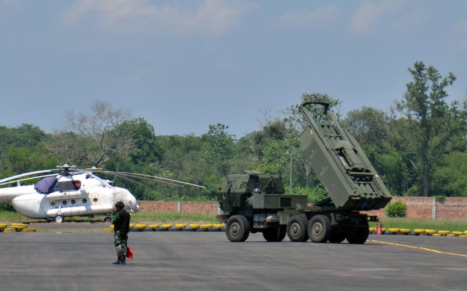 A U.S. Army High Mobility Artillery Rocket System, or HIMARS, simulates firing a rocket during the Super Garuda Shield exercise at Sultan Mahmud Badaruddin II International Airport in Palembang, Indonesia on Tuesday, Aug. 9, 2022. 