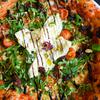 The burrata pizza at Nuovo Pizzeria in Manama, Bahrain, is a showstopper. It features a marinara base with fior di latte, sun-dried tomatoes, olives, cherry tomatoes and fresh arugula, finished with a whole burrata and a drizzle of pistachio cream. 