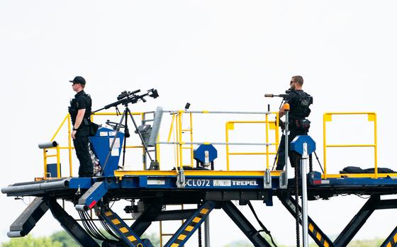 Secret Service on watch at Philadelphia Airport on Aug. 6. (MUST CREDIT: Demetrius Freeman/The Washington Post)