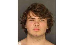 A handout photo from the Erie County, New York, district attorney’s office shows 18-year-old Payton Gendron, suspect in the mass shooting at a Buffalo supermarket on Saturday, May 14, 2022.