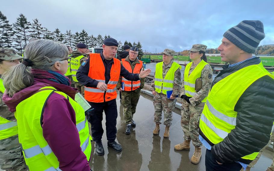 U.S. military personnel and Norwegian counterparts tour rail facilities near Rygge Air Base, Norway, on Oct. 18, 2022. The two countries’ militaries recently worked through deployment scenarios in the event of a threat.