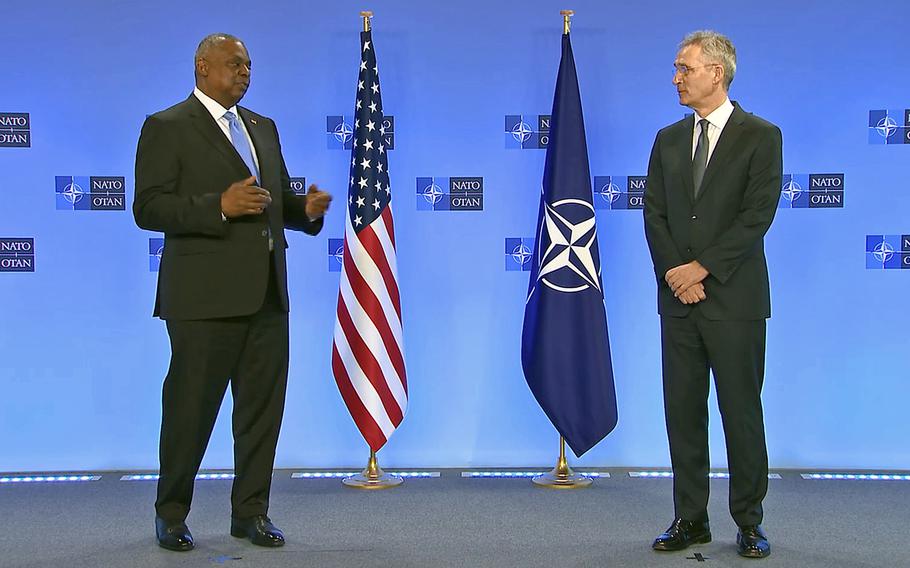 U.S. Defense Secretary Lloyd Austin, left, and NATO Secretary-General Jens Stoltenberg give statements before the start of a meeting of NATO defense ministers at the organization’s headquarters in Brussels, March 16, 2022.