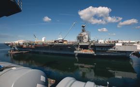 The future John F. Kennedy as seen from the flight deck of USS Gerald R. Ford at Newport News Shipbuilding in Virginia in January 2022. The aircraft carrier will not be delivered until March 2027, the Navy said. It had been scheduled to join the fleet this year, according to Navy budget estimates. 
