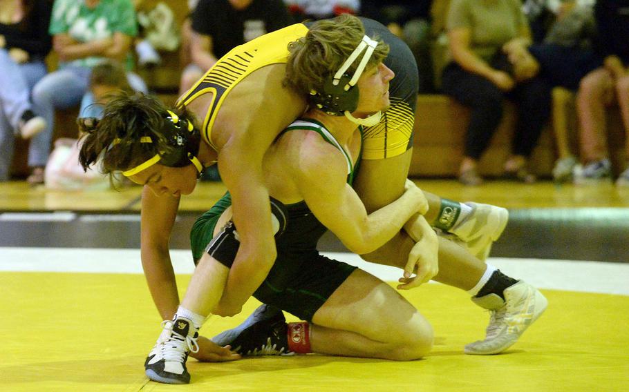 Senior Aidan Hutton, bottom, is one of six returning Kubasaki wrestlers.