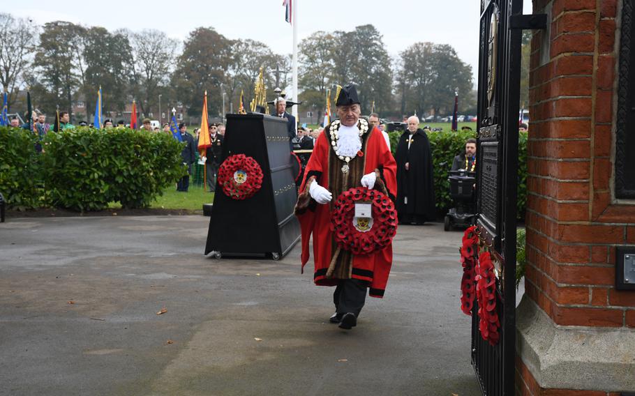 Nick Gowrley, the mayor of Stowmarket, England, lays a wreath Nov. 12, 2023, at a local observance of Remembrance Day. U.S. airmen from RAF Lakenheath also participated in the memorial and parade. 