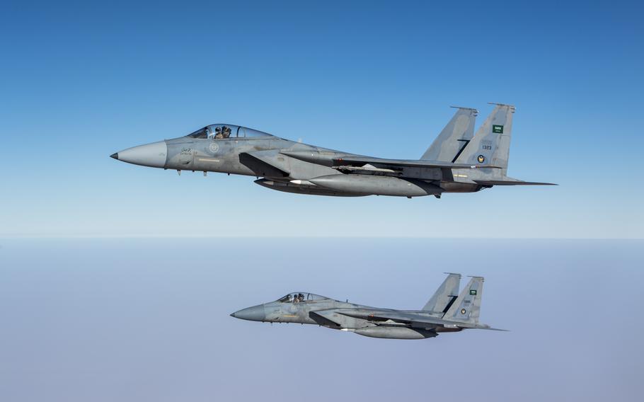 Saudi F-15C Eagles fly above Saudi Arabia in 2019. Attacks in Yemen by combat jets from a Saudi-led coalition are blamed for nearly 9,000 civilian deaths, according to a report by the Armed Conflict Location and Event Data Project.
