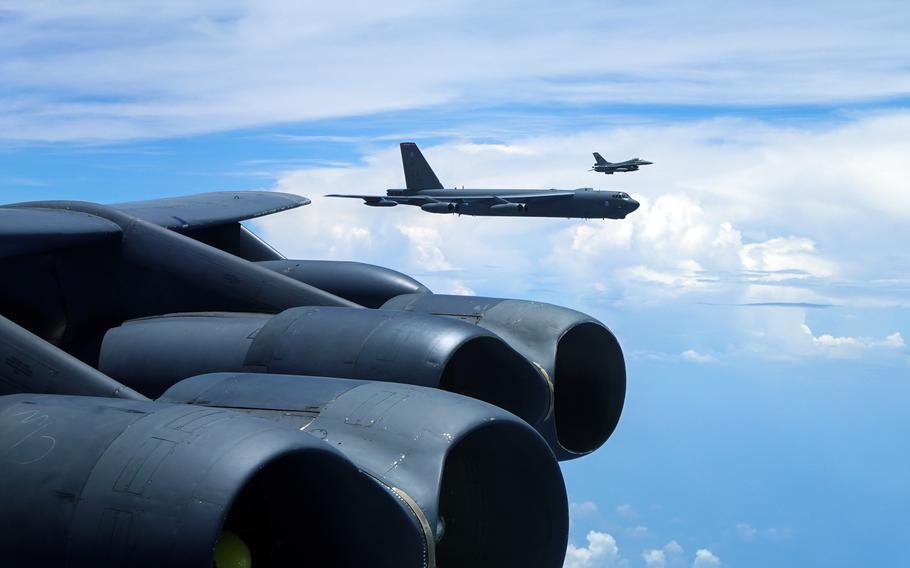 A B-52 Stratofortress assigned to the 2nd Bomb Wing at Barksdale Air Force Base, La., flies alongside an Indonesian Air Force F-16 somewhere in the Pacific, Wednesday, Sept. 1, 2021. 