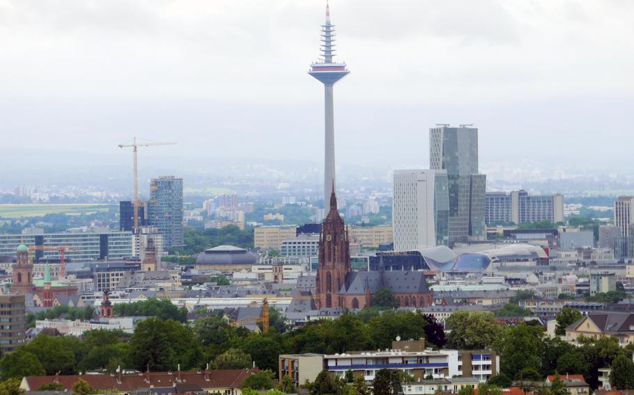 The 1,107-foot-tall Europaturm, or Europe Tower, rises high above Frankfurt’s cathedral, as seen from the Goetheturm.