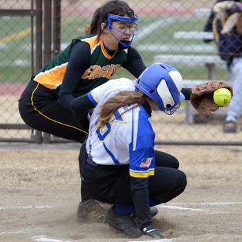 Yokota's Hailey Smith slides in safely ahead of the tag by Robert D. Edgren pitcher Alyssa Singletary during Friday's DODEA-Japan softball season opener at Yokota's Joel Headley Memorial Field. The Panthers won 20-6.