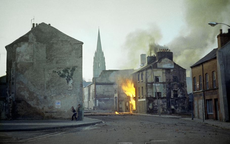 A building burns in the Bogside district of Londonderry, Northern Ireland, in the aftermath of Bloody Sunday, one of the the most notorious events of “The Troubles,” in February 1972.