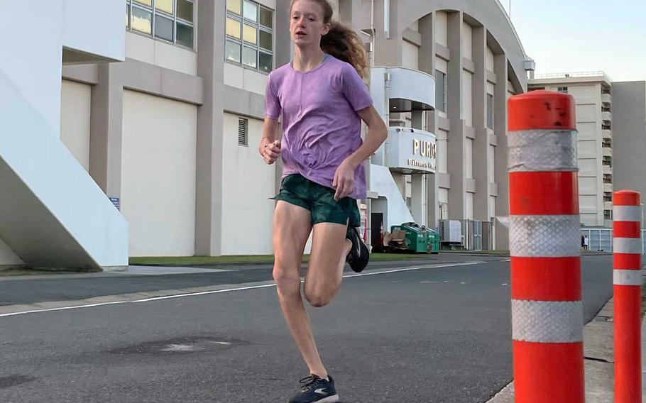 Nile C. Kinnick freshman Clare Herring won the girls Division I title in 19 minutes, 45.1 seconds in the Far East virtual cross country meet.