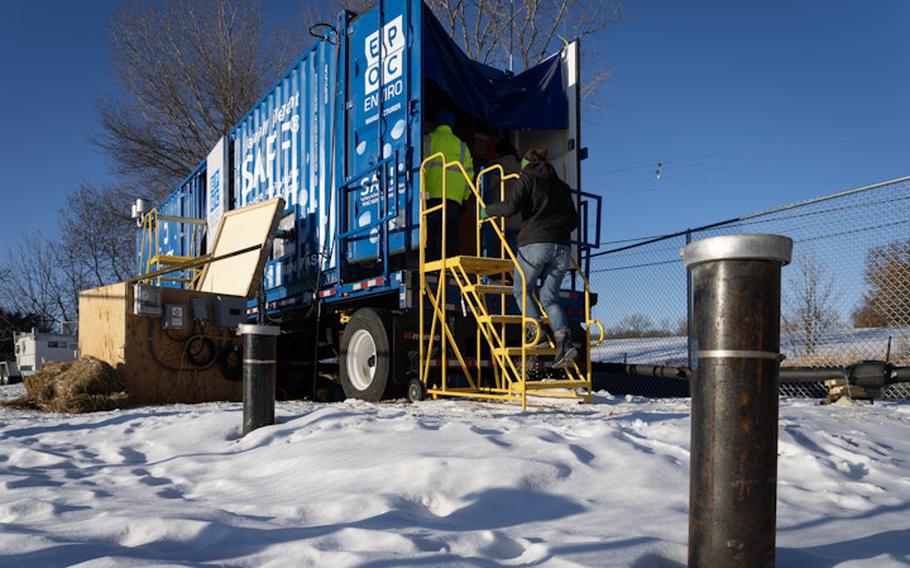 Several wells, indicated by pipes on the ground — one 420 feet deep — have been drilled to access an aquifer for testing in the SAFF container in Lake Elmo, Minn. 