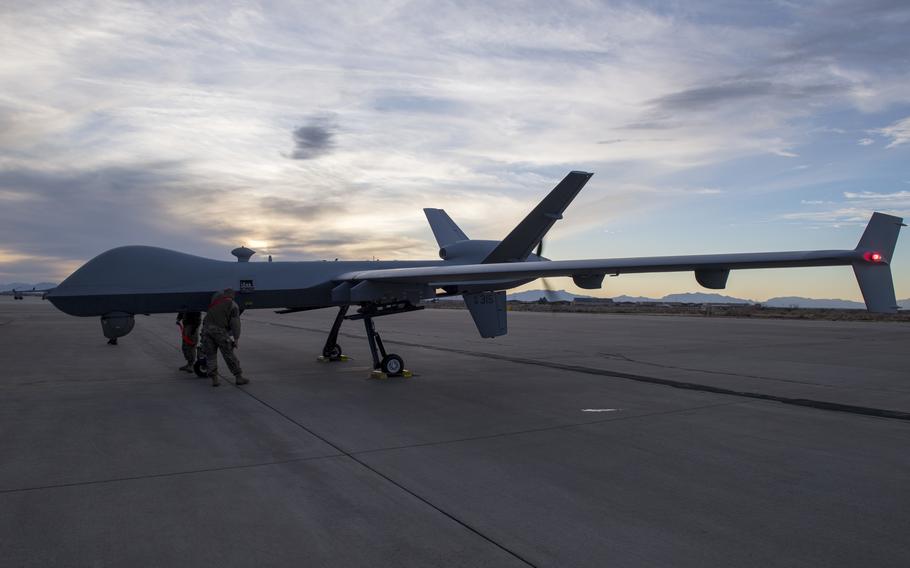 Airmen from the 29th Aircraft Maintenance Unit look over the 49th Wing’s newest MQ-9 Reaper, Jan. 8, 2020, on Holloman Air Force Base, N.M. 
