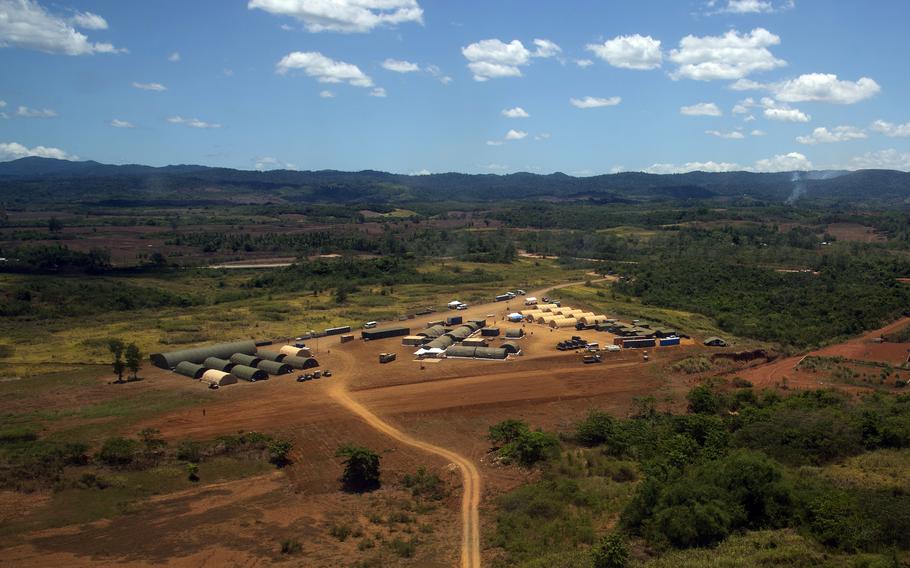 U.S. soldiers operate out of Logistics Support Area Mountain Medic, a clearing beside Lal-lo Airport the size of several football fields, during Balikatan training in the Philippines on May 4, 2024. 