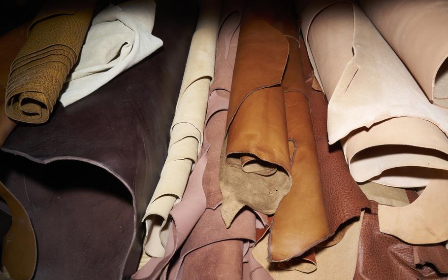 Rolls of leather for making sandals at Southern Polished in Tennessee. Natural leather is associated with high quality because it is pliable, breathable and molds to the foot. However, leather soles are generally less durable than synthetic ones. 